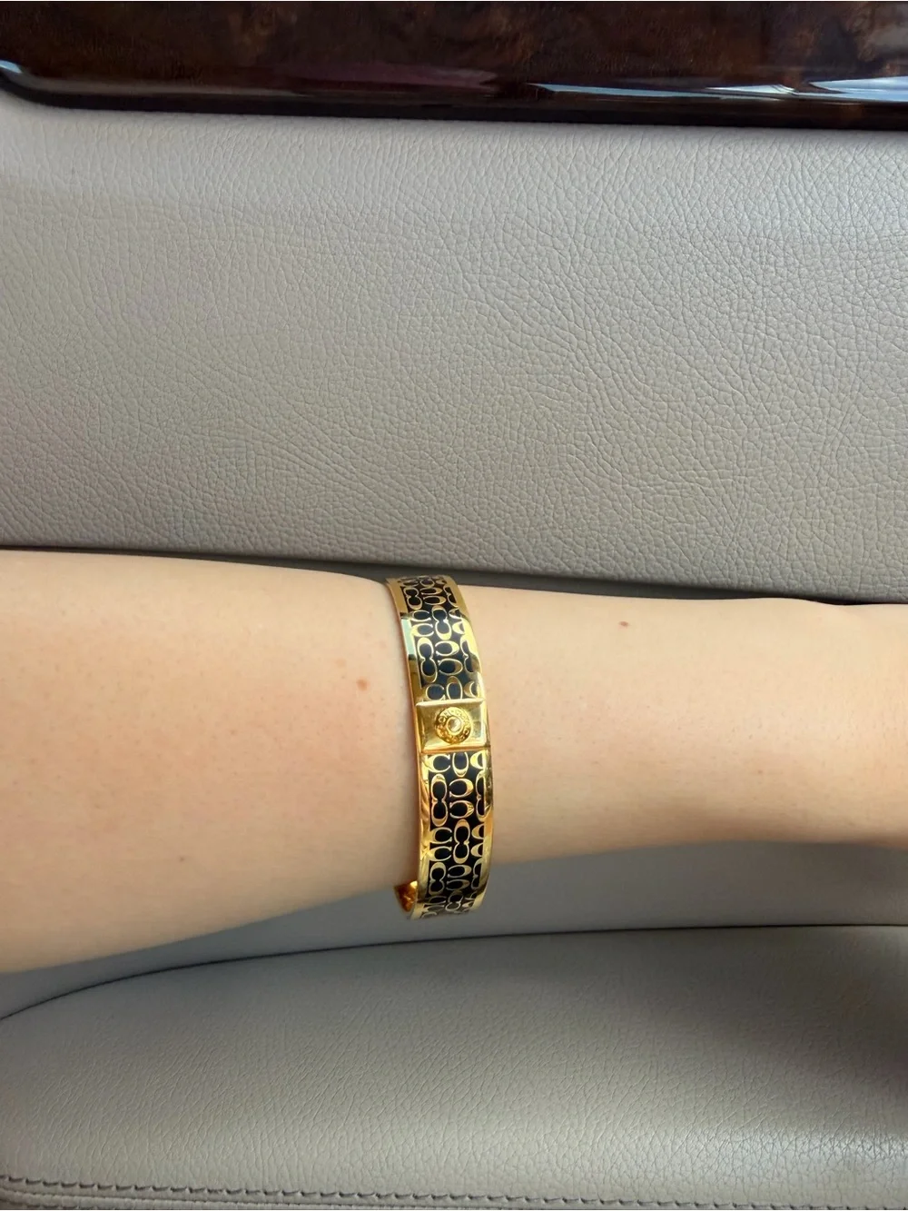 Coach Gold-Tone Bracelet with Black Enamel Signature Pattern
